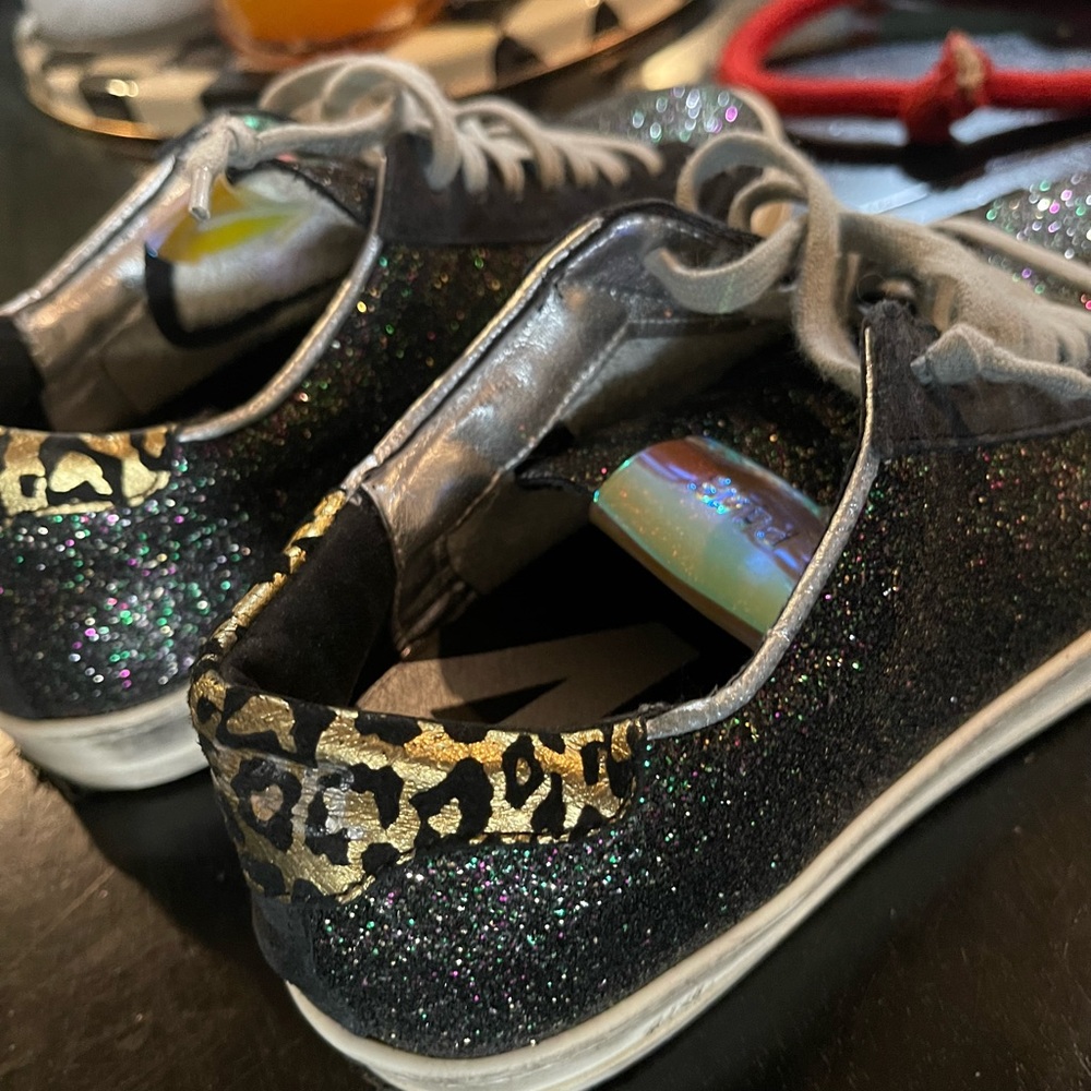 P448 sneakers. Size 8. Fits more like a 7/12. Used.